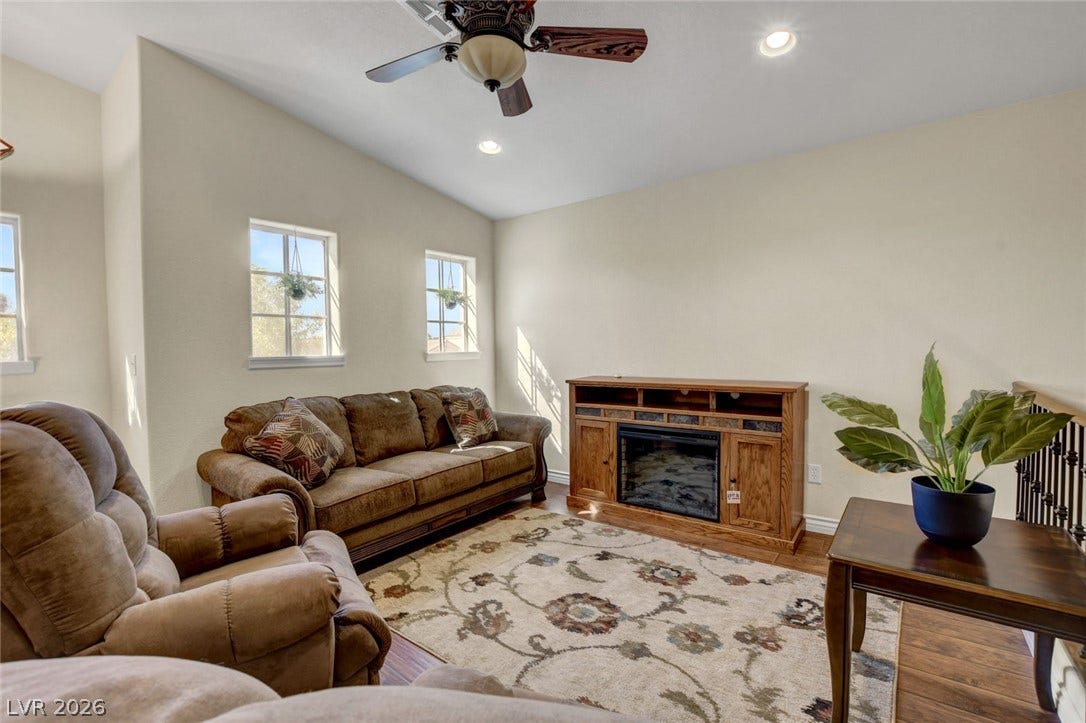 5508 Meridian Rain Street, North Las Vegas, NV 89031 High ceilings and warm wood floors define this comfortable living space.