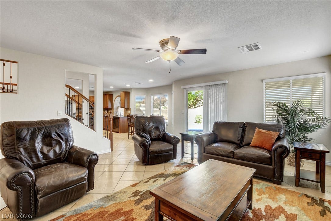 5508 Meridian Rain Street, North Las Vegas, NV 89031 An open floorplan seamlessly connects the living space to the adjacent kitchen area.
