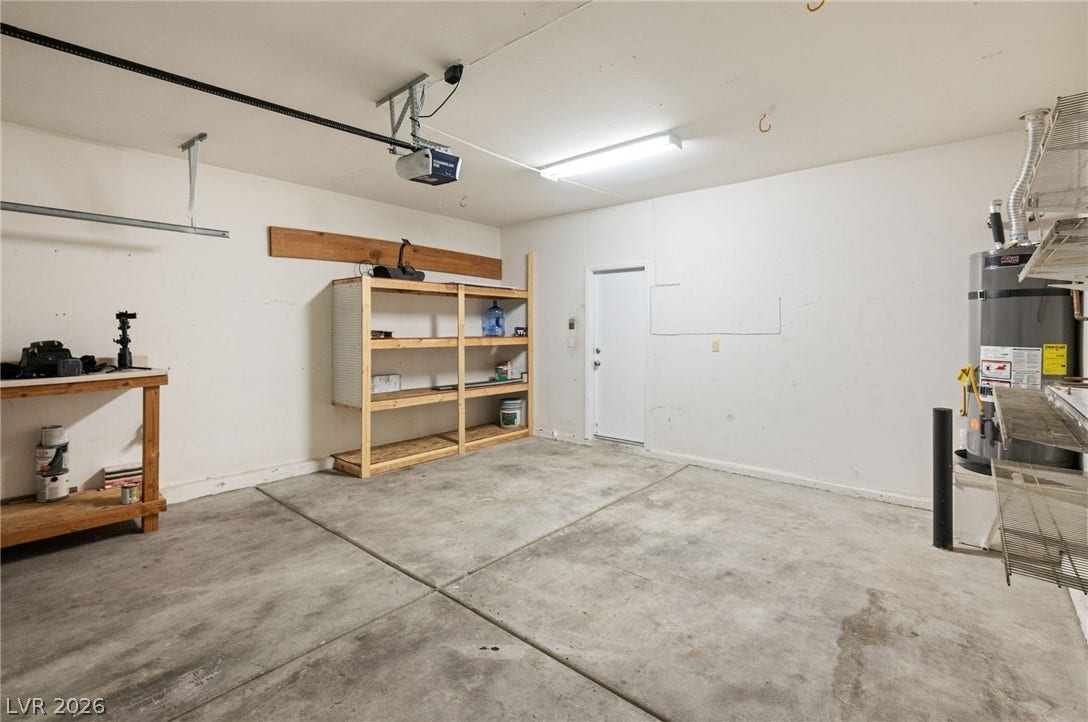 2381 Predera Avenue, Henderson, NV 89052 Concrete flooring and built-in shelving define this functional storage space.