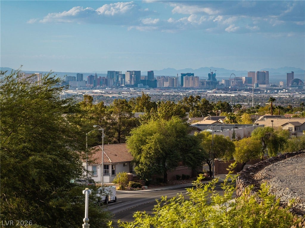 2381 Predera Avenue, Henderson, NV 89052 A sweeping skyline view stretches across the valley from this elevated vantage point.