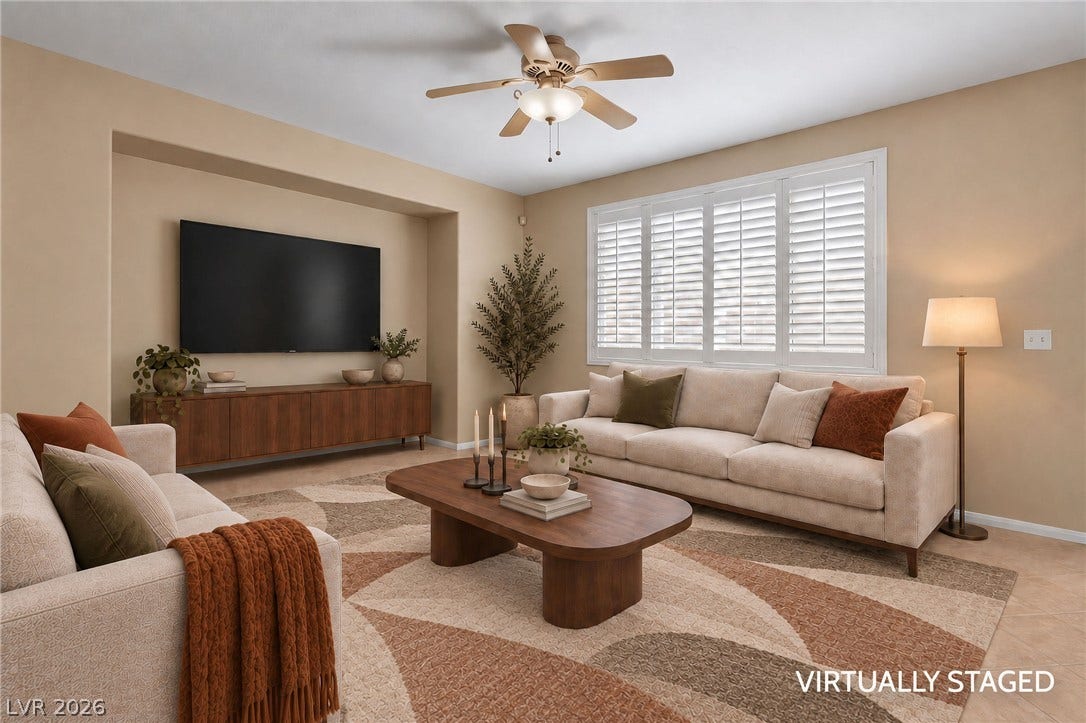 2381 Predera Avenue, Henderson, NV 89052 An alcove accentuates the media wall in this tiled living room with classic shutters.