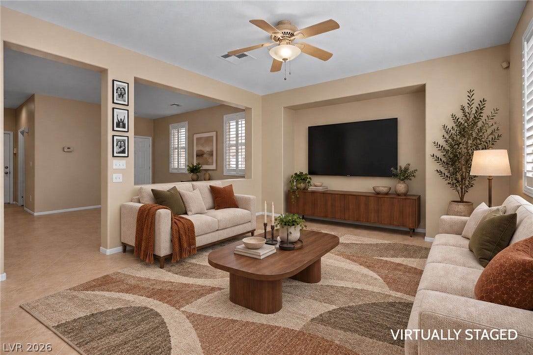 2381 Predera Avenue, Henderson, NV 89052 An open layout connects the comfortable living spaces finished with clean tile flooring.