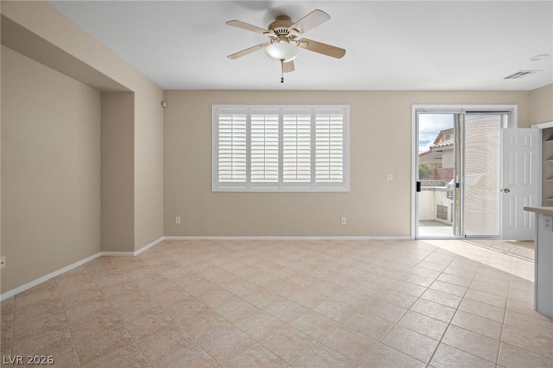 2381 Predera Avenue, Henderson, NV 89052 Tiled flooring and plantation shutters define this versatile open living space.