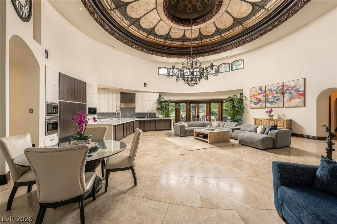 1513 Foothills Village Drive, Henderson, NV 89012 An extraordinary domed ceiling centers this open living space featuring polished tile floors.