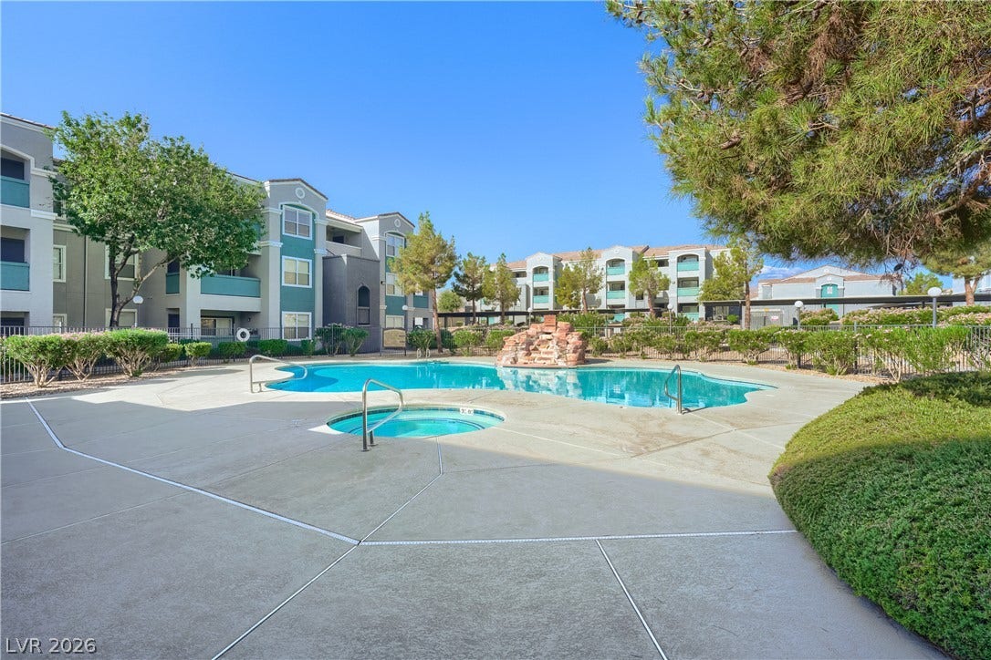 6955 N Durango Drive, #3102, Las Vegas, NV 89149 Relax in the sparkling community pool and spa that's surrounded by lush green landscaping.