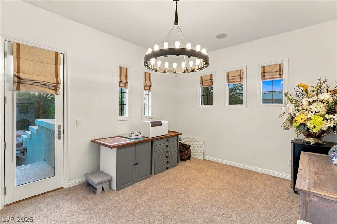 12056 Royal Dolnoch Court, Las Vegas, NV 89141 Natural light streams through multiple windows into this versatile space with comfortable carpeting.