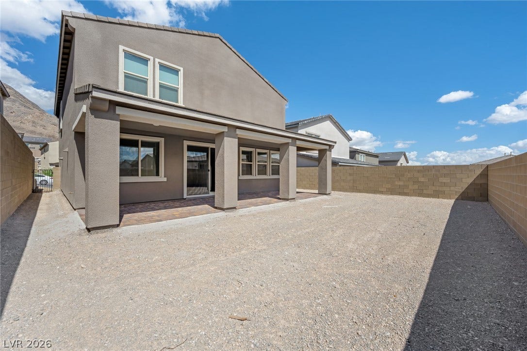 11823 Mimicking Song Lane, Las Vegas, NV 89138 A spacious backyard area includes a covered patio and is enclosed by privacy block walls.
