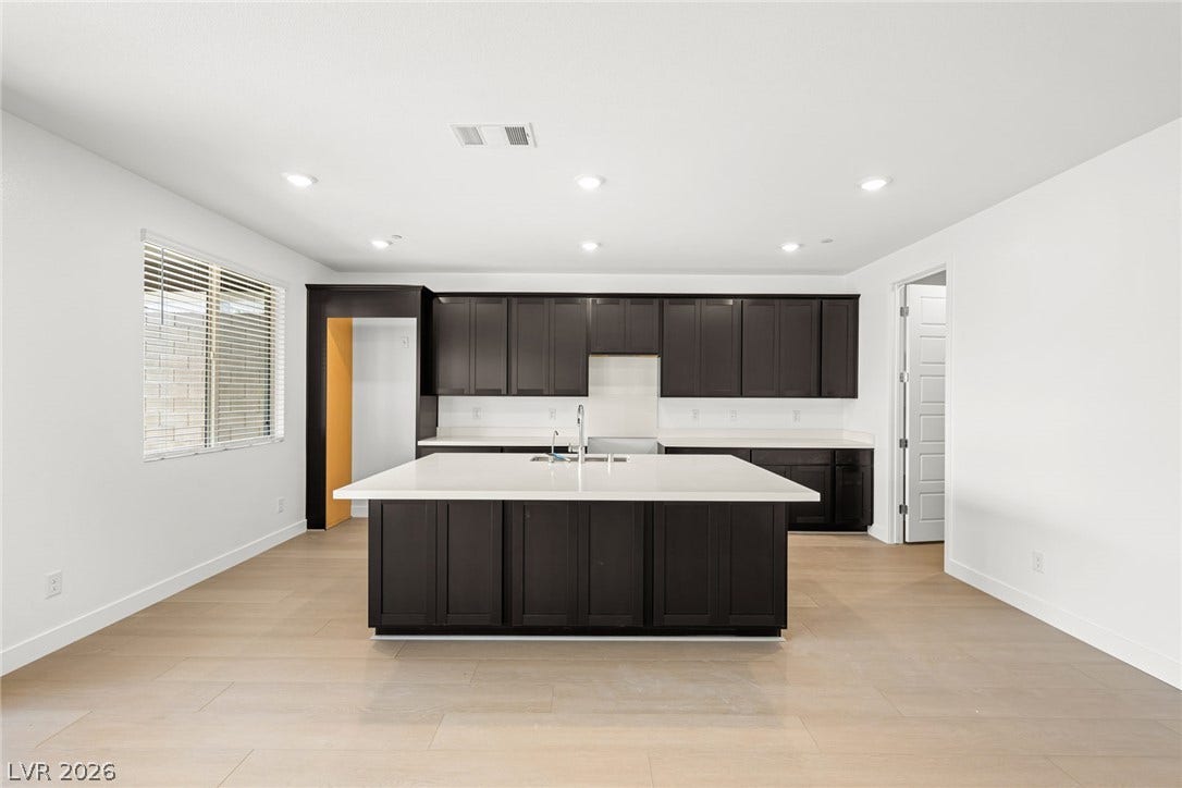 11823 Mimicking Song Lane, Las Vegas, NV 89138 Clean lines and a spacious center island define this modern culinary space.