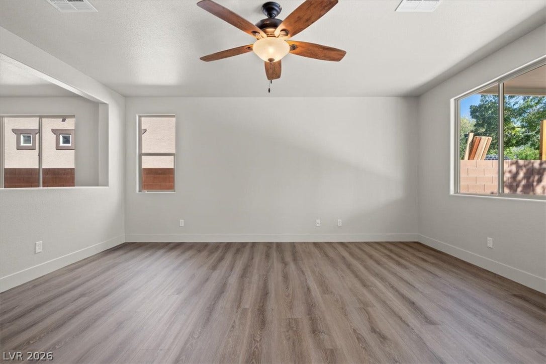 1874 Nature Park Drive, North Las Vegas, NV 89084 Clean lines and wide-plank flooring anchor this airy, light-filled space.