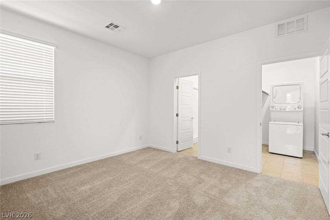 1663 Capri Falls Court, Henderson, NV 89011 An open bedroom connects seamlessly to a convenient adjacent laundry space.
