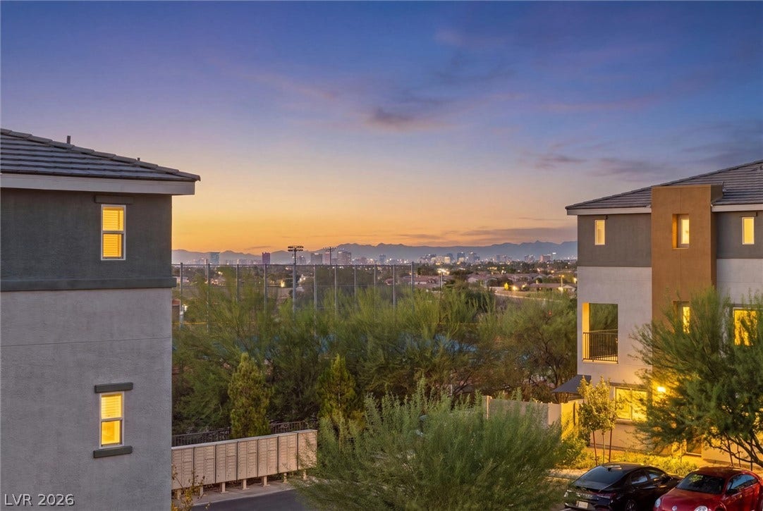 10059 Dazzling Sunrays Avenue, Las Vegas, NV 89129 Distant skyline vistas frame this modern residential setting.