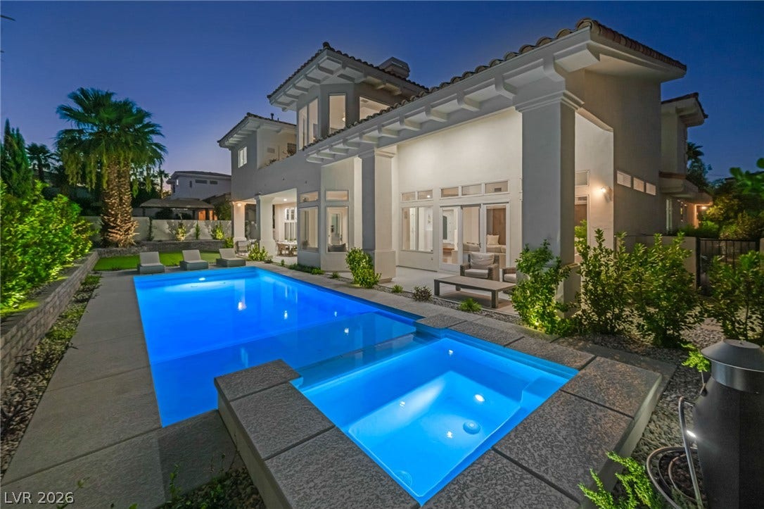 8805 Spanish Mountain Drive, Las Vegas, NV 89148 An inviting pool and spa highlight the rear of this elegant multi-level estate.