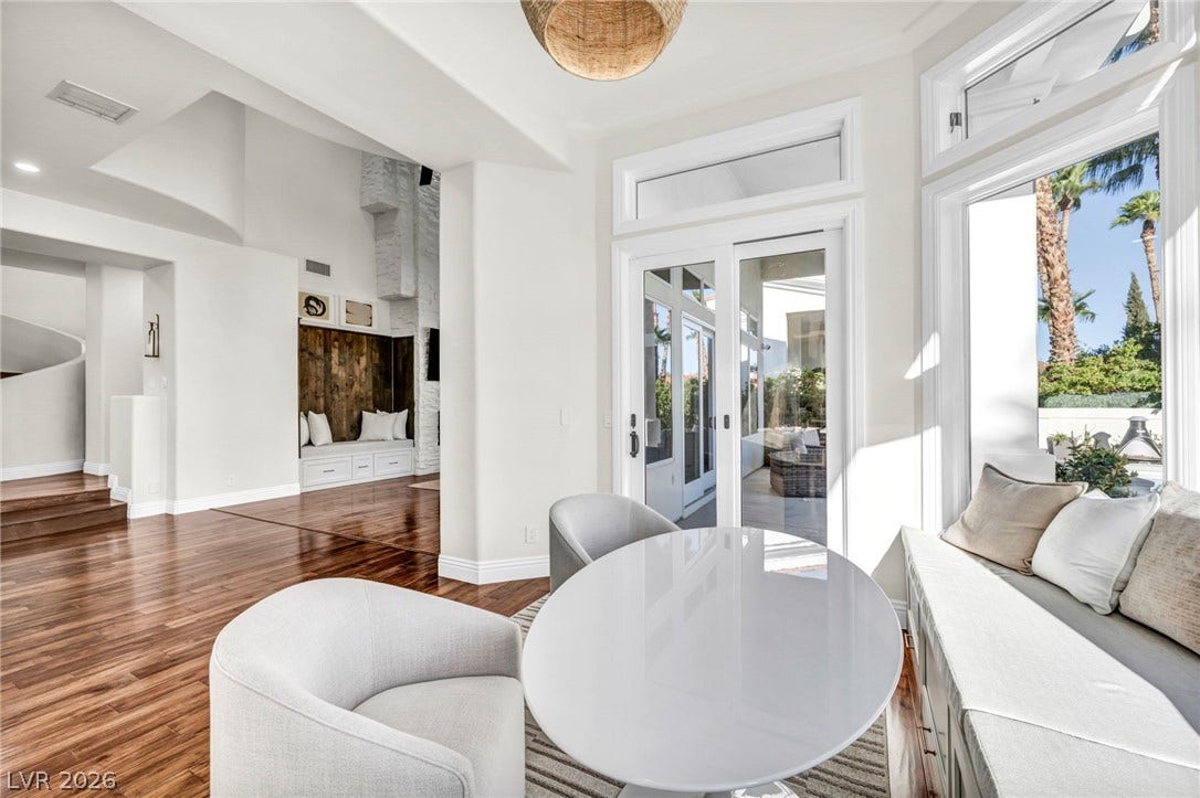 8805 Spanish Mountain Drive, Las Vegas, NV 89148 Lustrous hardwood floors and abundant natural light define this inviting dining nook.
