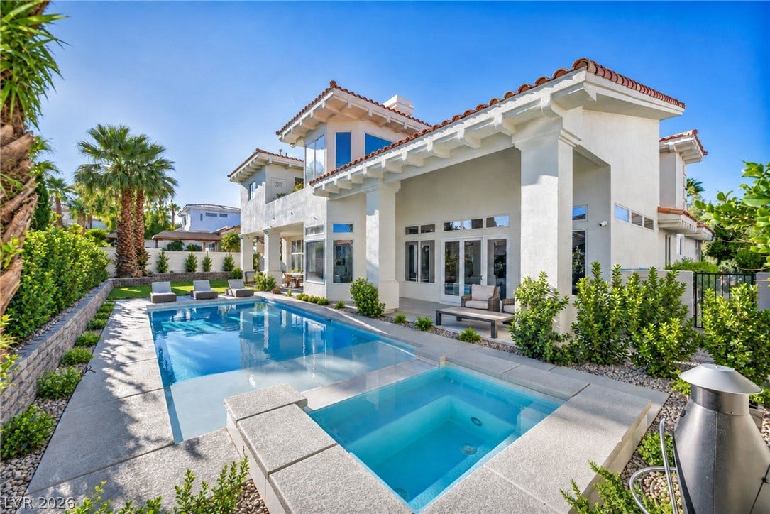 8805 Spanish Mountain Drive, Las Vegas, NV 89148 An inviting swimming pool and integrated spa complement the elegant Mediterranean architectural design.