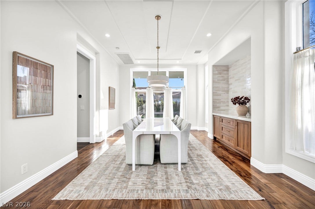8805 Spanish Mountain Drive, Las Vegas, NV 89148 Rich hardwood floors contrast beautifully with crisp walls and an elegant built-in buffet.