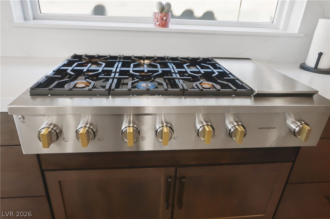 High-end culinary preparation is made simple with a professional-grade built-in gas range.