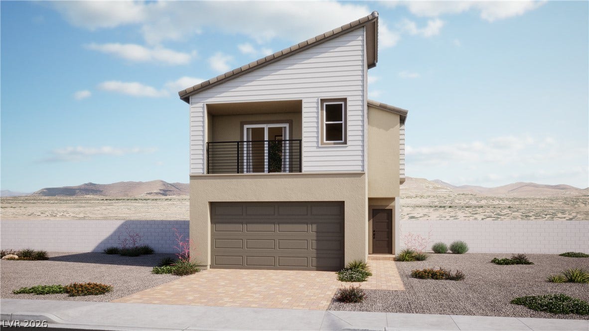 Modern desert architecture frames this dual-level residence featuring an upper-level balcony and integrated garage.