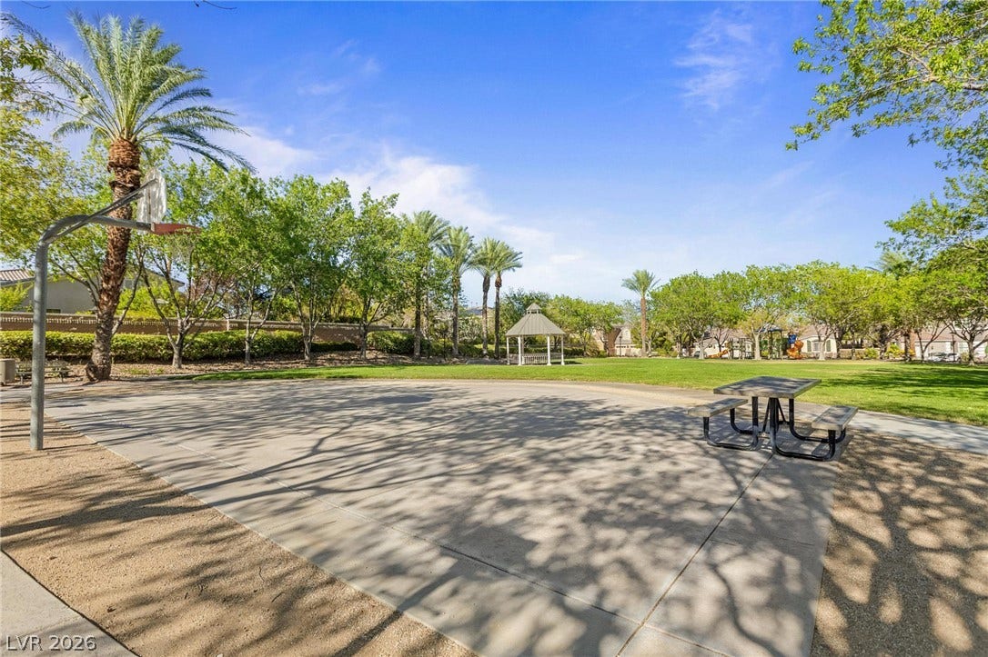 8088 Dark Hollow Place, Las Vegas, NV 89117 A community park with a basketball court, picnic area, and a charming gazebo, perfect for outdoor enjoyment.