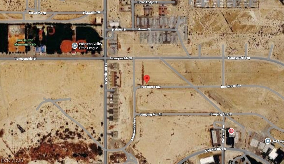 Satellite view illustrates the parcel location and surrounding regional road access.