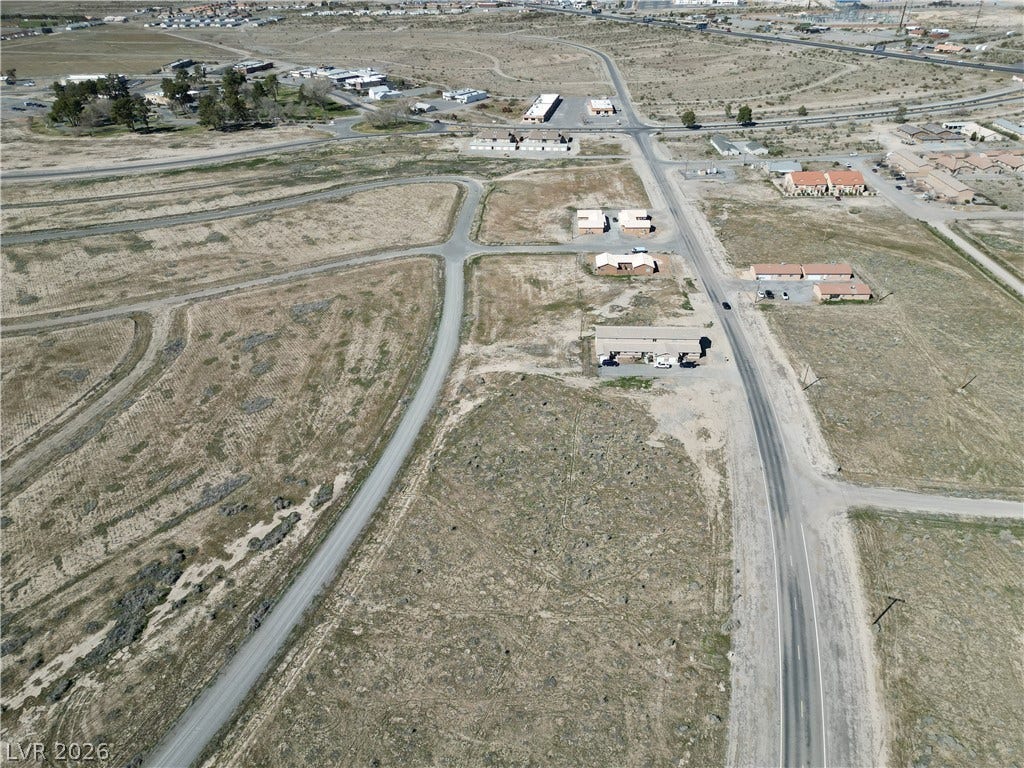 2061 E Ironhorse Street, Pahrump, NV 89048 Vast desert parcels sit adjacent to paved roadways, offering excellent development potential.