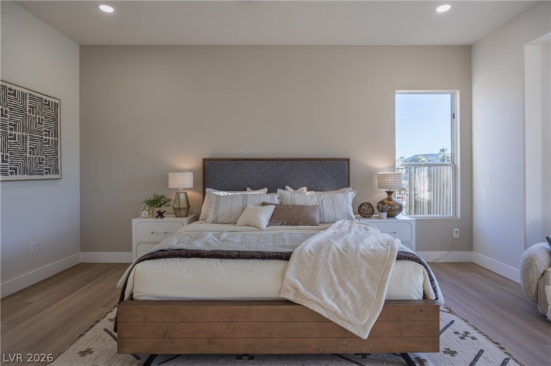 10248 Andante Court, Las Vegas, NV 89135 Bedroom featuring recessed lighting and wood finished floors
