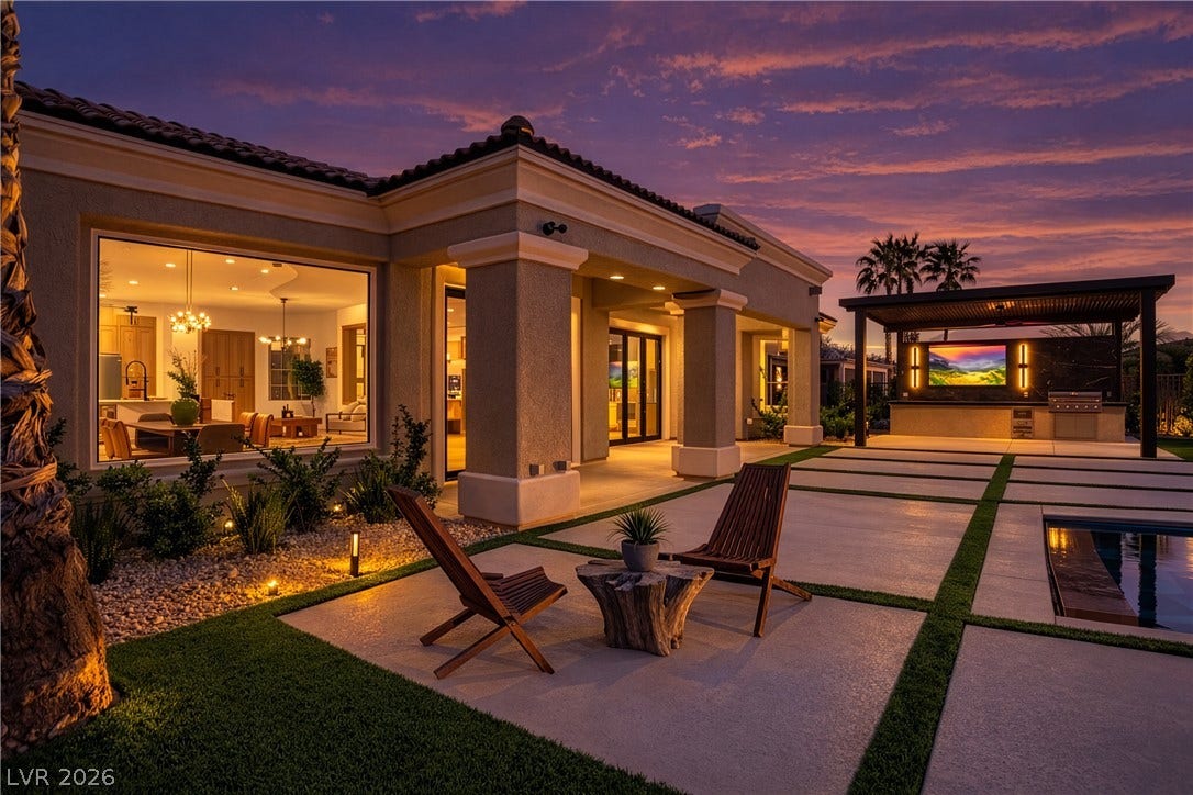 10248 Andante Court, Las Vegas, NV 89135 Patio terrace at dusk featuring an outdoor kitchen and a patio