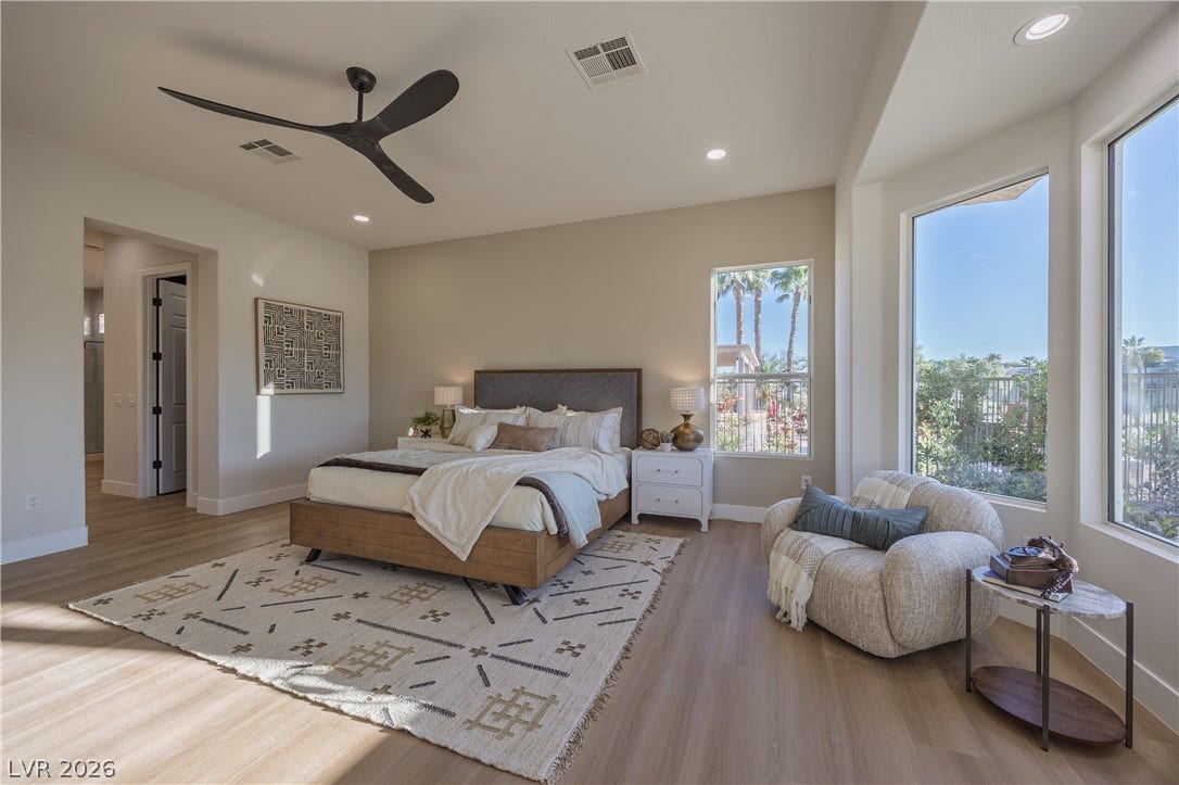 10248 Andante Court, Las Vegas, NV 89135 Bedroom with light wood-style floors, recessed lighting, and ceiling fan