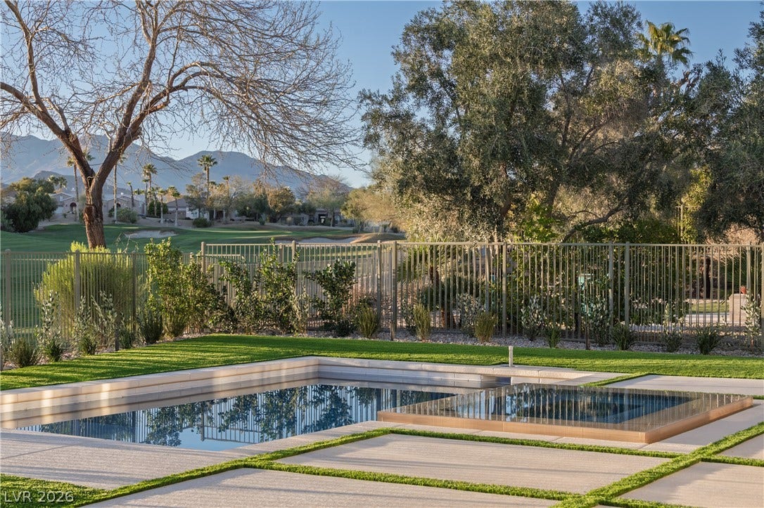 10248 Andante Court, Las Vegas, NV 89135 View of swimming pool featuring a fenced backyard and a mountain view
