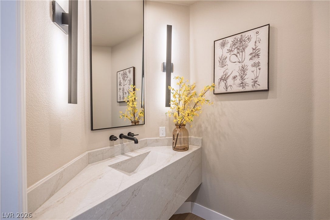 10248 Andante Court, Las Vegas, NV 89135 Bathroom featuring a textured wall and vanity