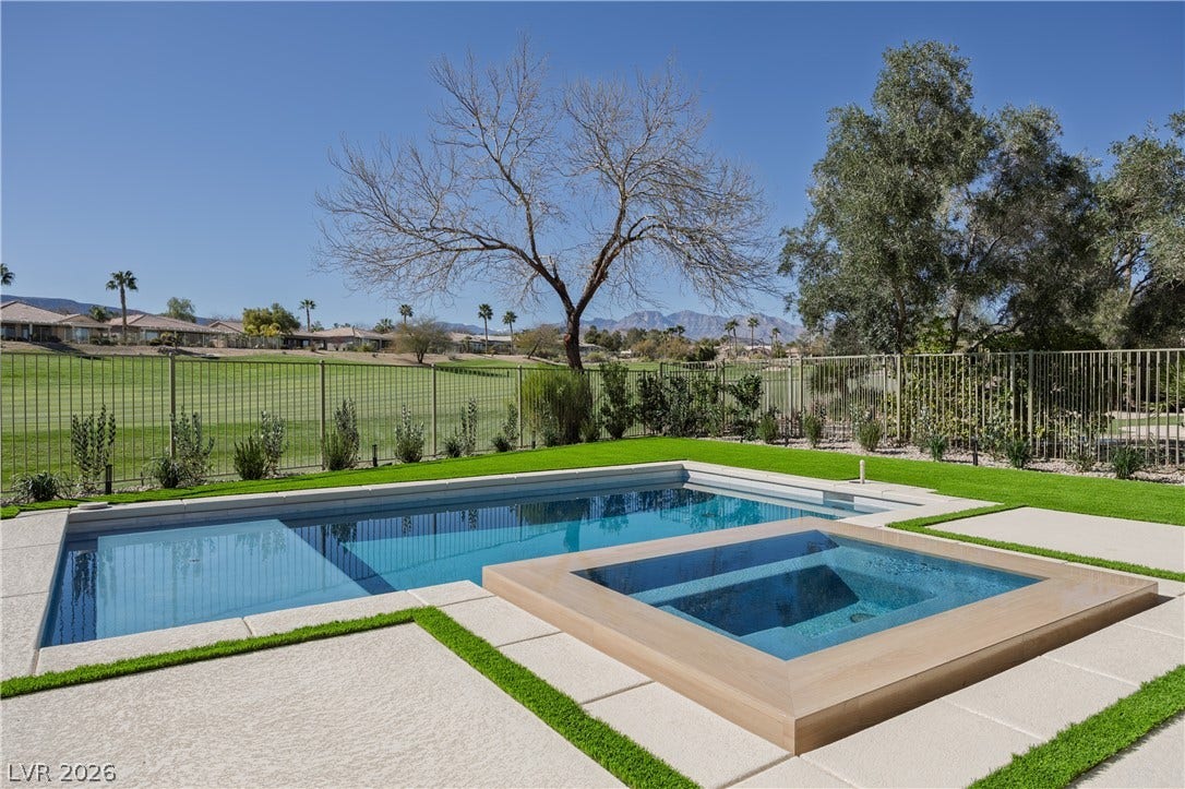 10248 Andante Court, Las Vegas, NV 89135 Integrated pool / spa featuring a fenced backyard and a patio