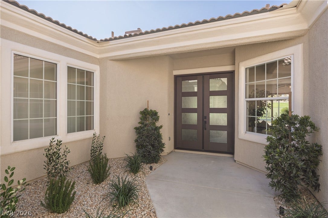 10248 Andante Court, Las Vegas, NV 89135 Entrance to property featuring french doors, stucco siding, and a tile roof