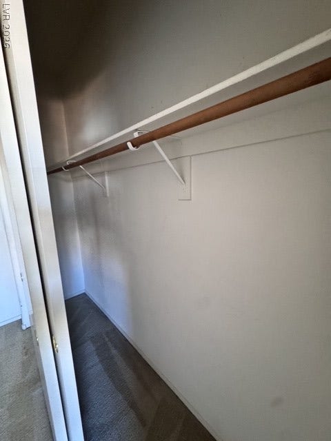 1881 W Alexander Road, #2107, North Las Vegas, NV 89032 Functional storage space includes a sturdy hanging rod and upper shelving.