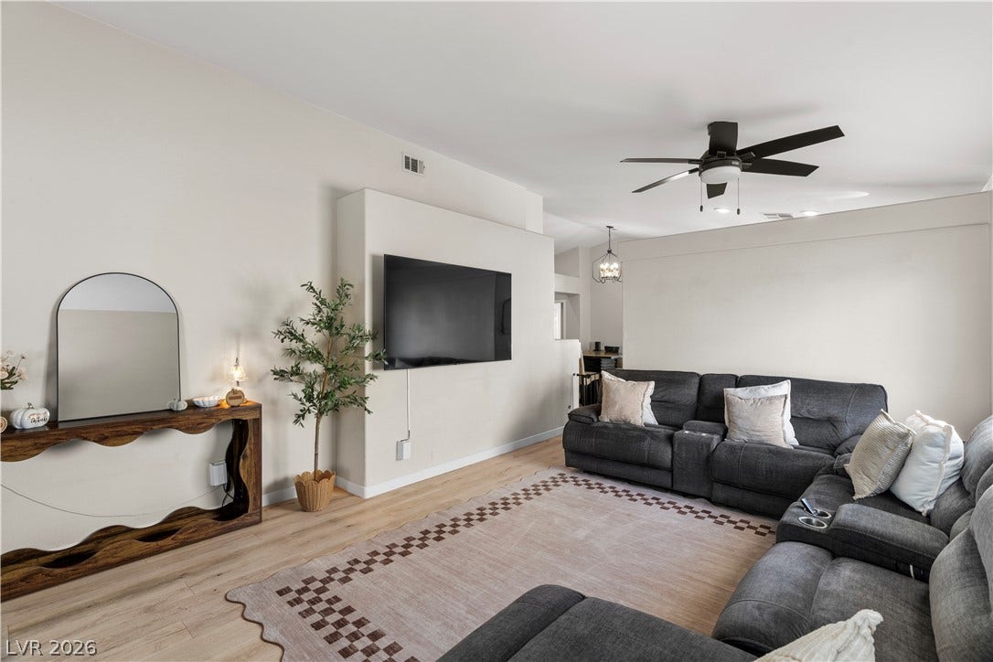 4927 Rancho Domingo Court, North Las Vegas, NV 89031 A spacious layout and smooth hard surface flooring define this welcoming living area.