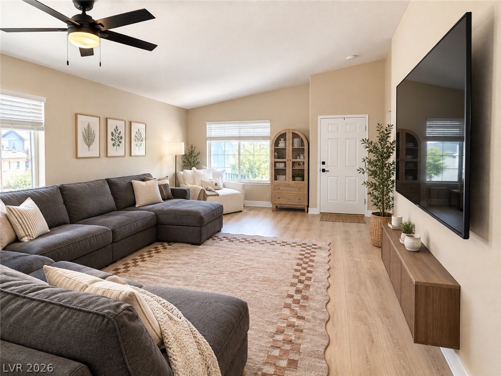 4927 Rancho Domingo Court, North Las Vegas, NV 89031 High vaulted ceilings and wood floors define this welcoming main living area.