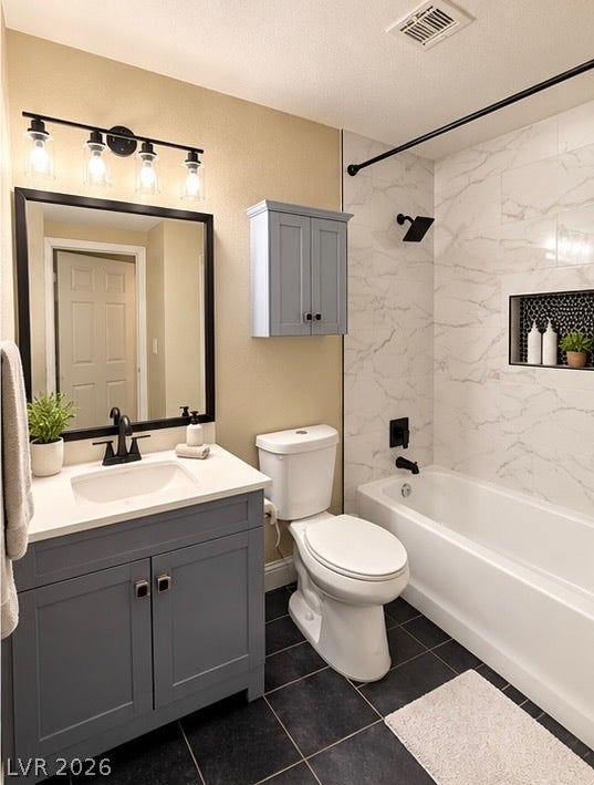 4927 Rancho Domingo Court, North Las Vegas, NV 89031 Crisp stone counters and a tiled tub surround elevate this modern bathroom.