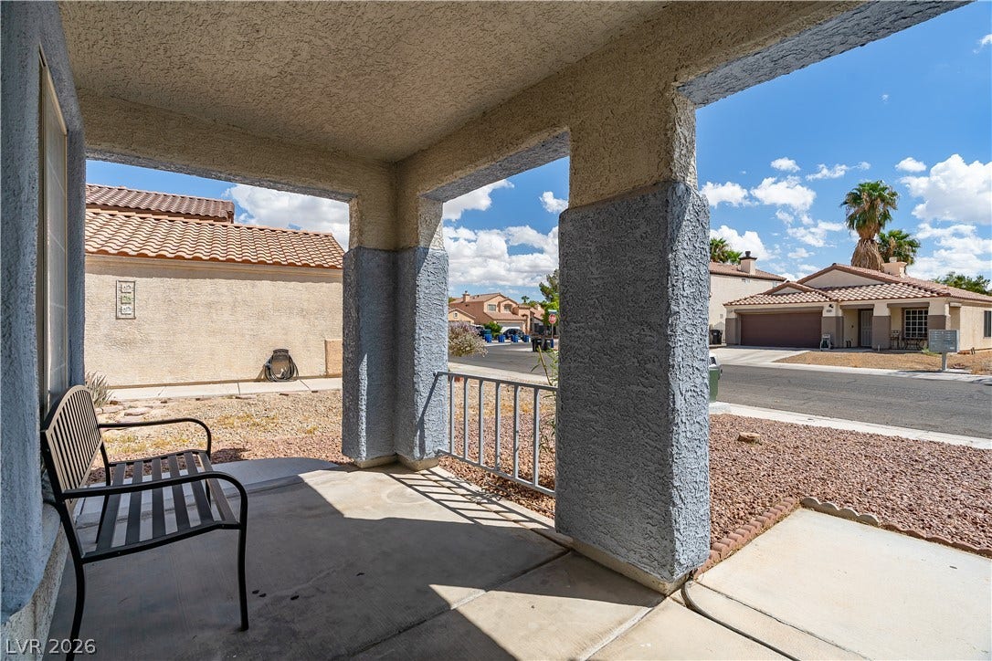 4927 Rancho Domingo Court, North Las Vegas, NV 89031 An inviting covered entryway framed by robust pillars looks out over the neighborhood.