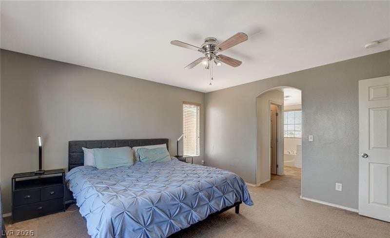 4 Goldleaf Falls Avenue, North Las Vegas, NV 89031 A spacious layout leads from this comfortable sleeping area into the private en suite bath.