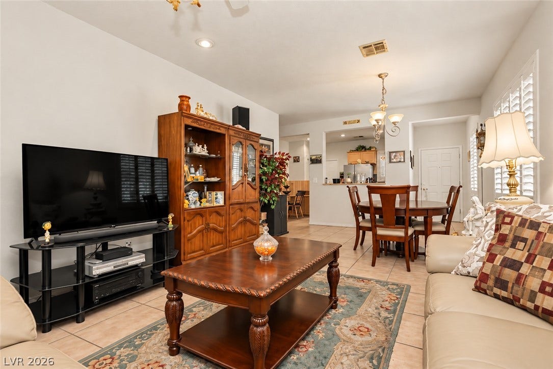 Tile flooring and an open layout seamlessly connect the main gathering areas.