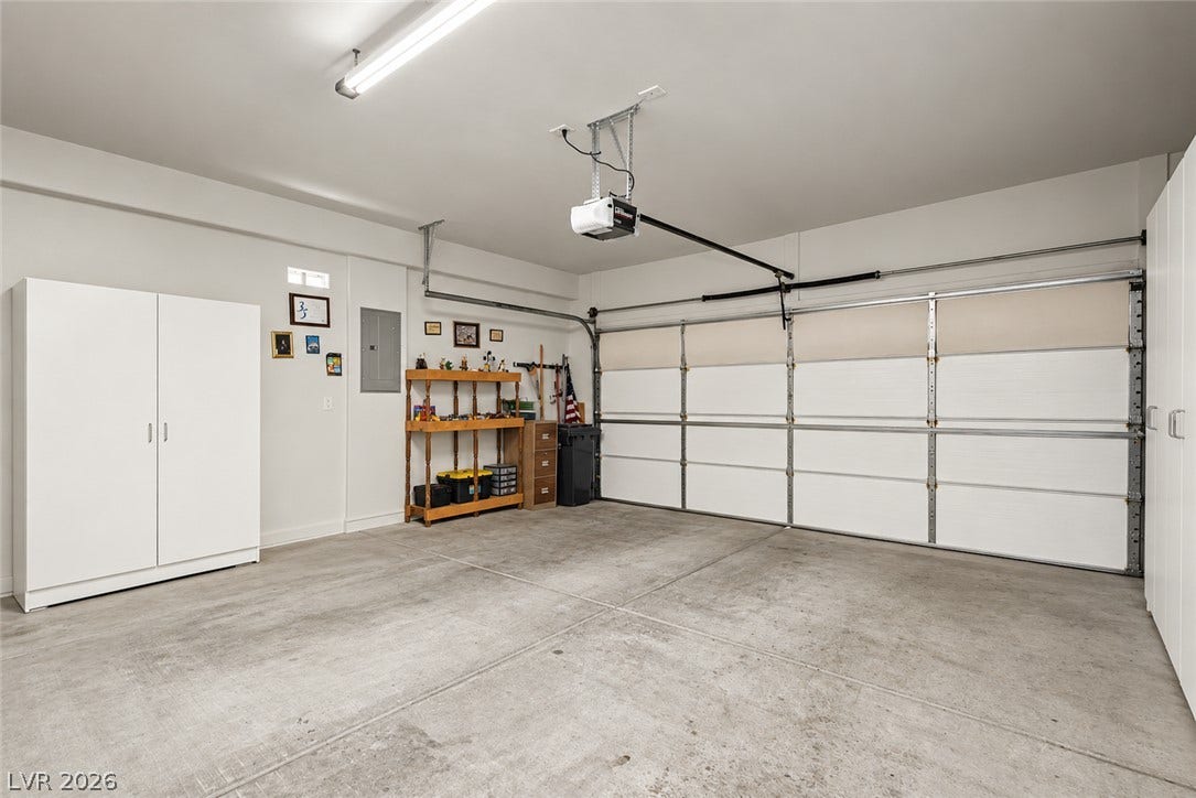 Smooth concrete floors and ample wall space define this clean, spacious garage.