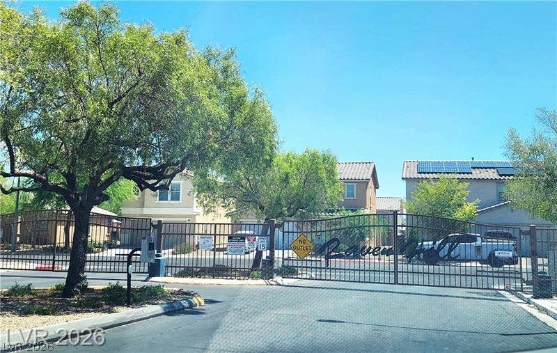 1705 Ronzard Avenue, North Las Vegas, NV 89032 A secure gated entrance leads into this private neighborhood lined with modern residences.