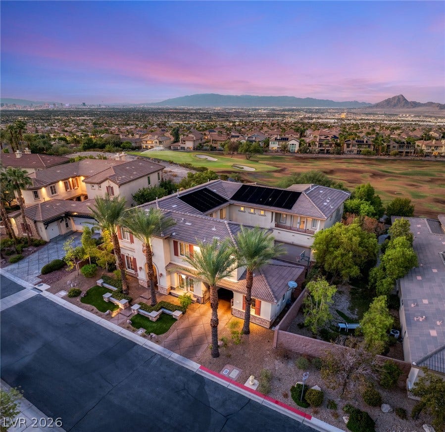 1372 Enchanted River Drive, Henderson, NV 89012 Elevated views capture the impressive architecture of this estate set against a mountain backdrop.