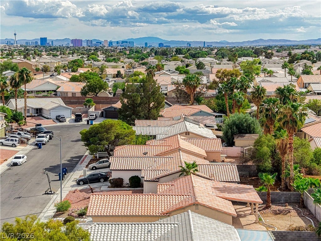 5239 Ferrell Mountain Court, North Las Vegas, NV 89031 Distant city skyline views rise above the surrounding residential neighborhood.