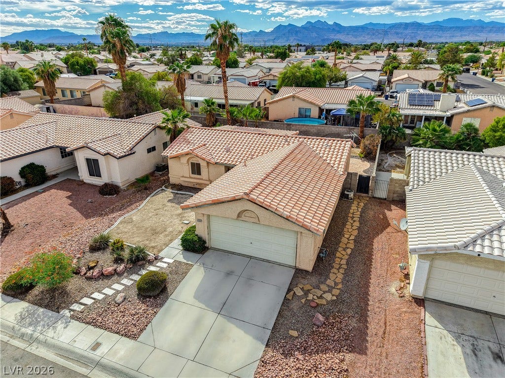 5239 Ferrell Mountain Court, North Las Vegas, NV 89031 Tiled roofs and mountain views define this desert neighborhood.