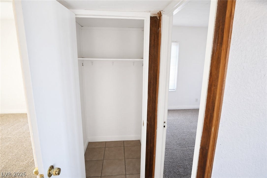 123 W Victory Road, Henderson, NV 89015 Practical built-in shelving provides convenient storage space next to carpeted rooms.