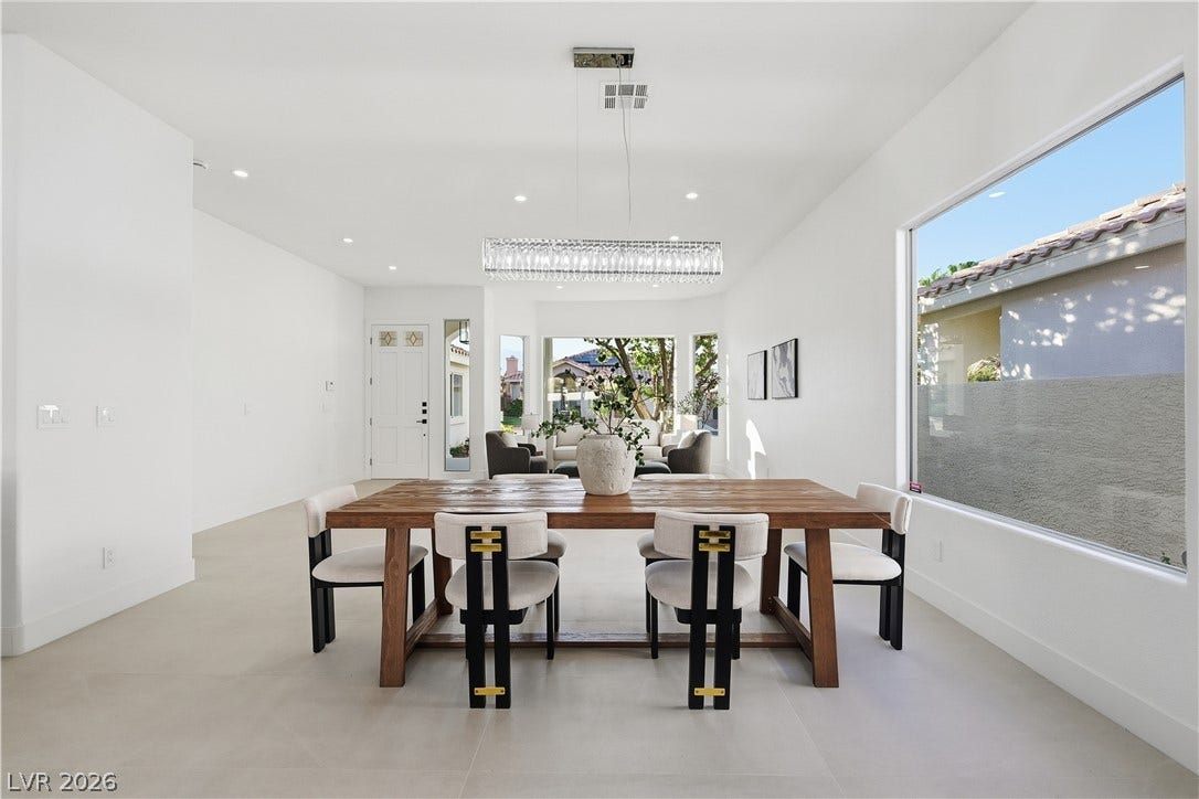 1612 Hidden Spring Drive, Las Vegas, NV 89117 High ceilings and clean architectural lines define this open dining space.