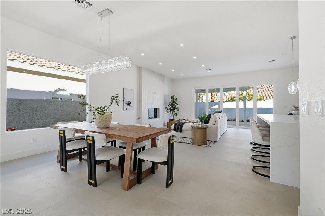 1612 Hidden Spring Drive, Las Vegas, NV 89117 Clean lines and smooth flooring define this spacious, open-concept dining area.