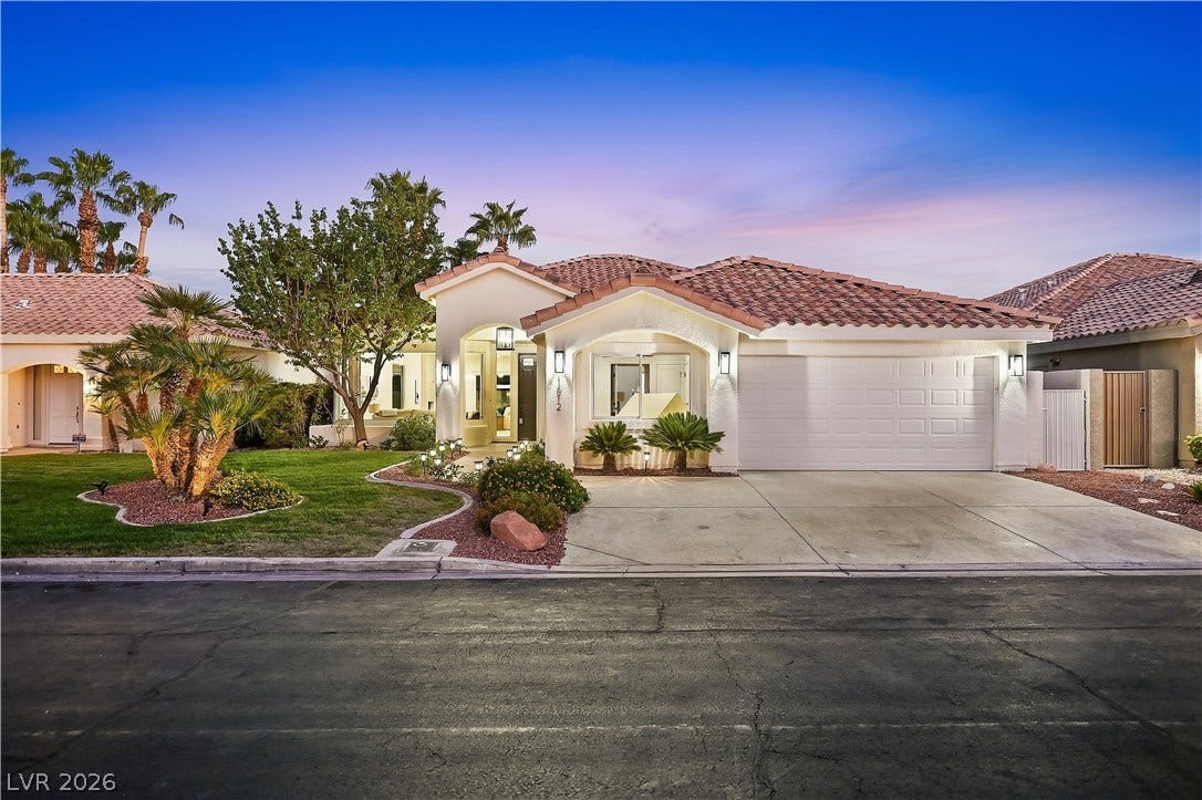 1612 Hidden Spring Drive, Las Vegas, NV 89117 Classic Mediterranean styling defines this elegant single-story home with a clay tile roof.