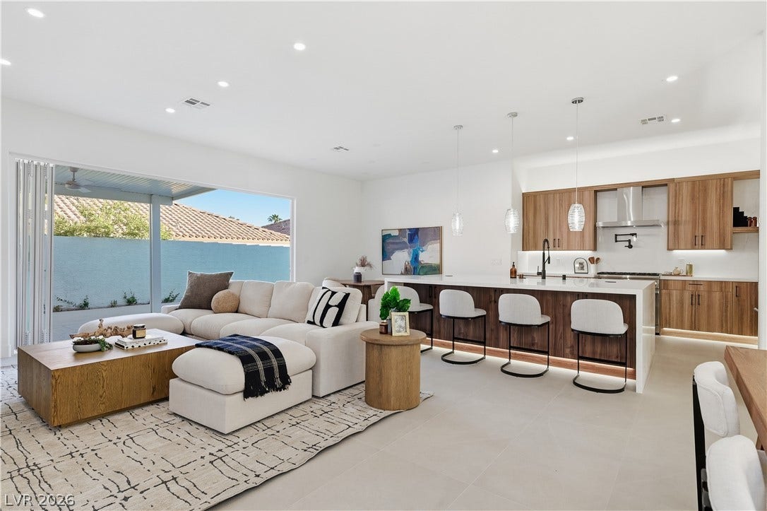 1612 Hidden Spring Drive, Las Vegas, NV 89117 Seamless indoor-outdoor living flows beautifully from this open-concept kitchen and living area.