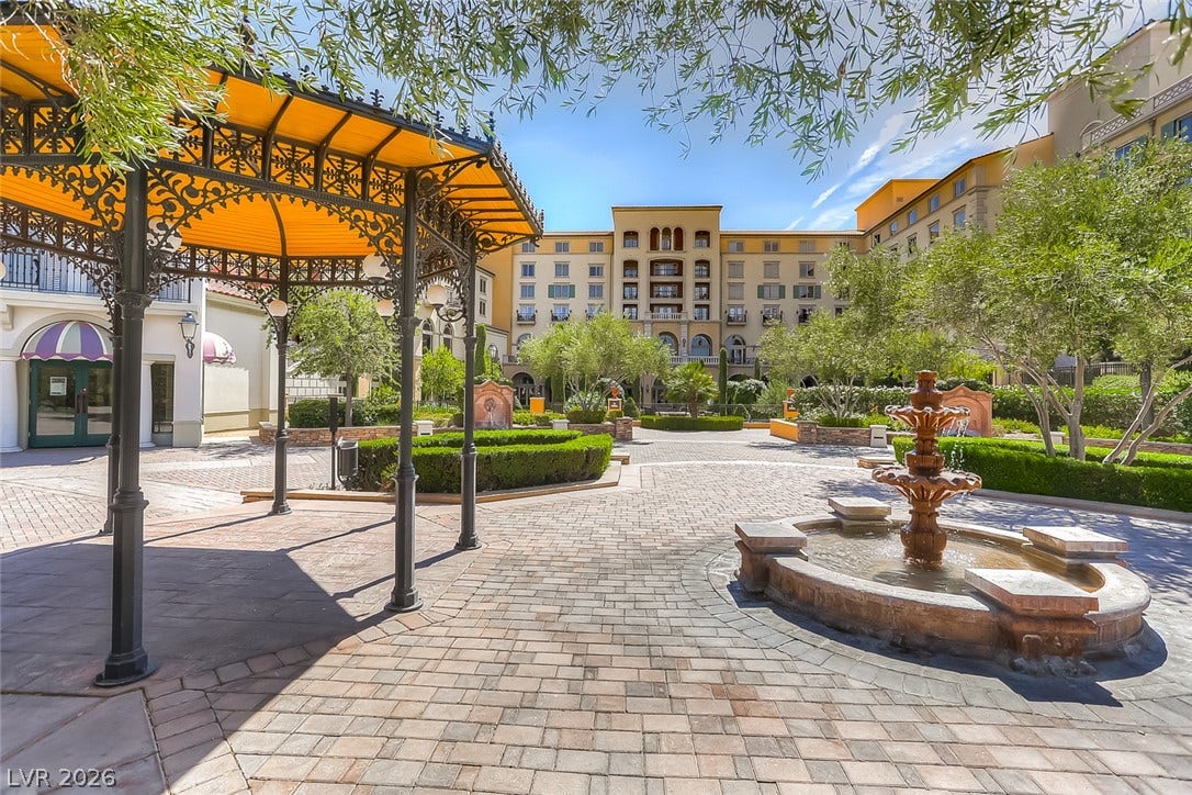 30 Sand Star Lane, Henderson, NV 89011 An elegant central courtyard features a multi-tiered stone fountain and a classic decorative gazebo.