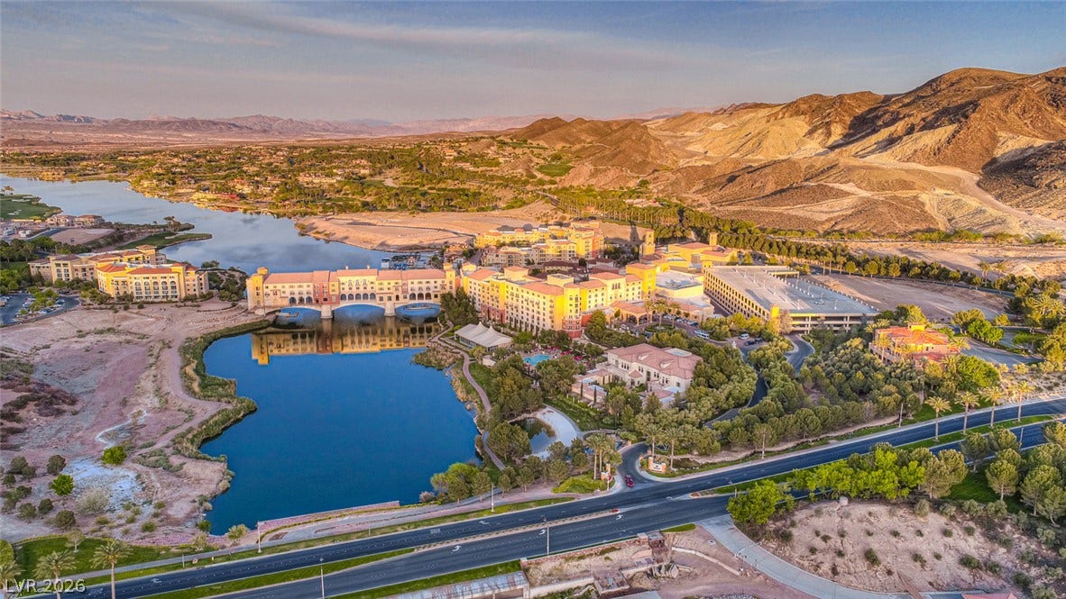 30 Sand Star Lane, Henderson, NV 89011 Dramatic desert peaks form a striking backdrop for this master-planned lakeside community.